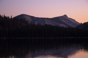 Dusk falls on serene Tenaya Lake in the high country of Yosemite National Park