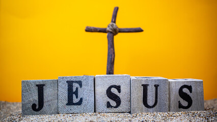 wooden cross with the inscription Jesus