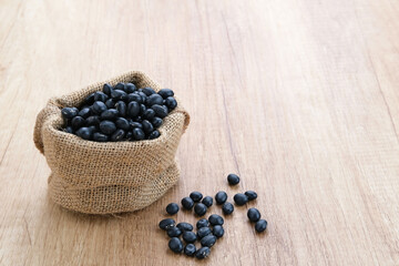 Fototapeta na wymiar Black soybean seeds (kacang kedelai hitam), food ingredients 