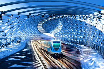 Green background of train moving through future rail tunnel bridge with blurred motion showing...