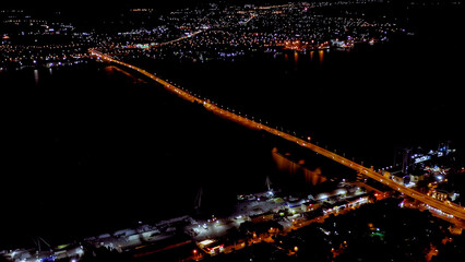Astrakhan, Russia. Astrakhan bridge - Bridge over the Volga river at night, Aerial View