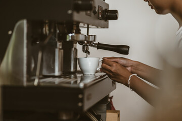 espresso machine in coffee shop counter offering freshly brewed coffee. coffee maker concept.