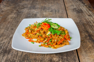Delicious Chinese Noodle or Kwetiau or Kwetiaw Served on White Plate