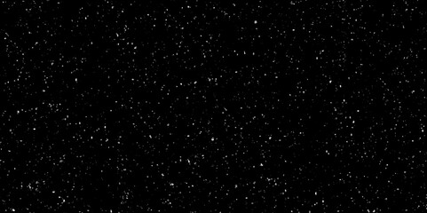 Flying dust particles on a black background. Starry nigh sky galaxy space background.