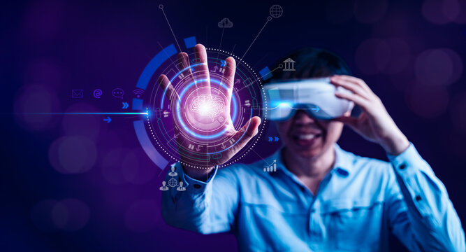 Man with virtual reality VR goggle, futuristic lifestyle, Metaverse technology and cloud computing