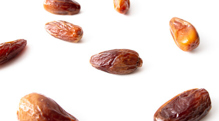Dried dates isolated on white background.