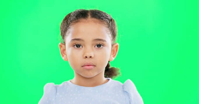 Eyebrow raise, green screen and child face of a young girl with a funny, meme and emoji expression. Comic, kid and humor of a little kid with isolated studio background with youth comedy and alone