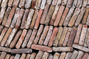 Beautiful background a large lot of old vintage bricks for the restoration.