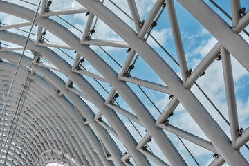Close-up of a metal arch with a glass roof .