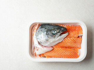 fresh fish on a plate, raw salmon