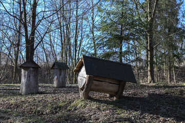 Authentic beehive made of logs. The old apiary.