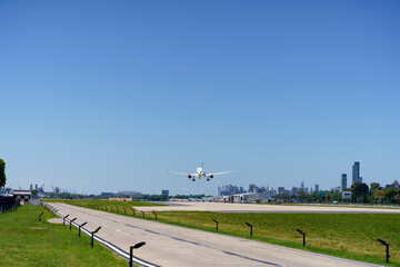 Airport runway with a plane taking off. Travel, transport, business concept