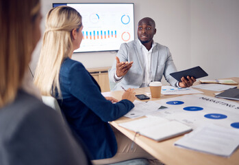 Planning, presentation and people with business growth meeting, corporate charts or graph and data analysis of profit revenue. Professional black man, boss or manager speaking to employees or clients