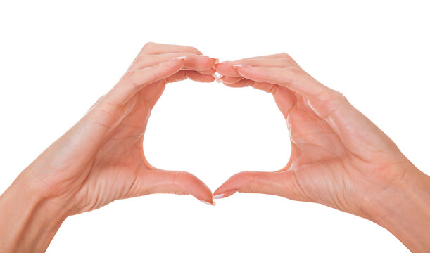 Female hands forming a heart shape on white background, close-up