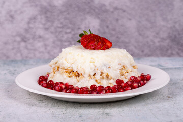 Gullac dessert. Traditional Ramadan dessert. Gullac dessert with pomegranate and strawberry on the plate