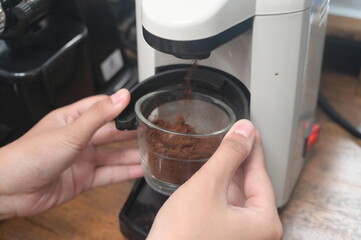 espresso coffee machine with roasted coffee beans