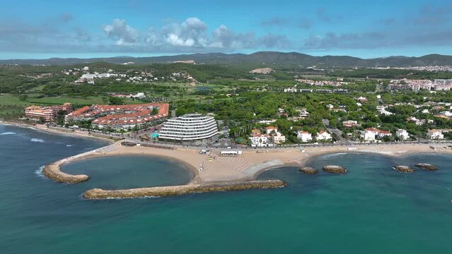 Sitges seaside. Mediterranean landscape of the beach and hotels.