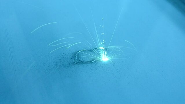 Metal 3D printer. Work 3d printer for metal close-up. 3D printer printing object from metal powder by laser sintering. New modern technologies of printing 3D printer.Selective laser melting technology