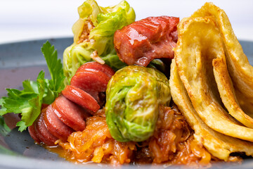 Cabbage leaves with minced meat and potato pancake