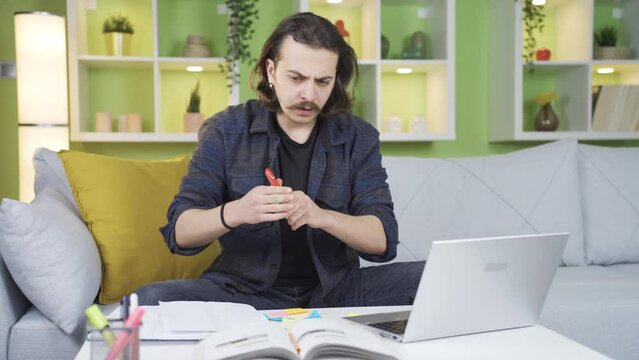 The man who doesn't know how to react to a shocking event.
Self-employed man working from home gets flustered and panics.
