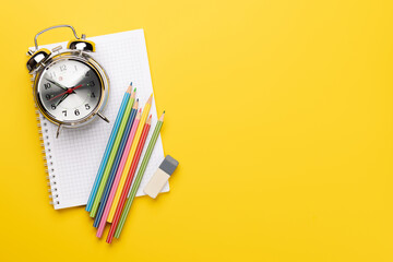 School supplies and stationery on yellow