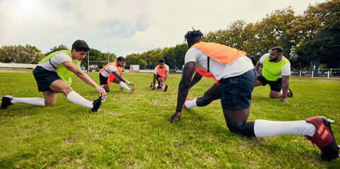 Sports, training and men outdoor for rugby on grass field with diversity team stretching as warm...