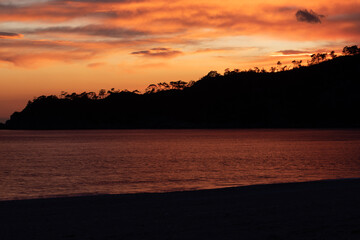 Fototapeta premium sunset on the beach view with yellow sky