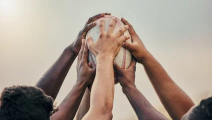 Fotobehang Gymnastiek Diversity, team and hands together in sports on rugby ball for support, motivation or goals outdoors. Hand of sport group unity in fitness, teamwork or success for match preparation or game  © Delcio/peopleimages.com