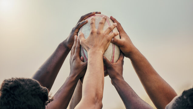 Diversity, team and hands together in sports on rugby ball for support, motivation or goals outdoors. Hand of sport group unity in fitness, teamwork or success for match preparation or game