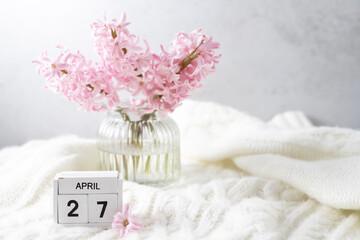 Pink hyacinth in vase and calendar date April 27. Included in the group of horizontal and vertical photos with all April dates