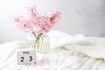 Pink hyacinth in vase and calendar date April 23. Included in the group of horizontal and vertical photos with all April dates