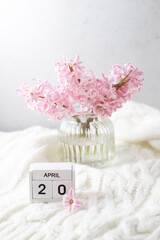 Pink hyacinth in vase and calendar date April 20. Included in the group of horizontal and vertical photos with all April dates