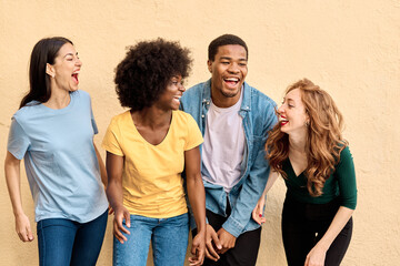 Studio portrait of happy multiethnic people laughing