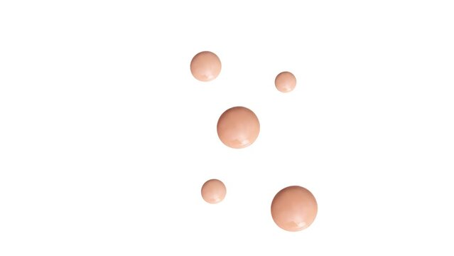 cosmetic smear round drops of foundation on a white backgroun