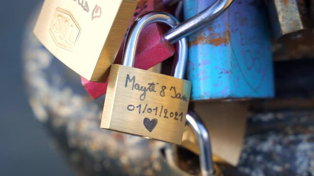 Love locks hanging on the Pont des Arts bridge in Paris, France