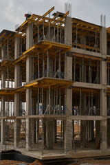 Construction site. High rise Building under construction. Construction of high-rise residential building