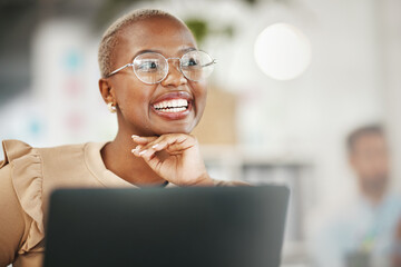 Happy black woman, thinking and smile, relax at desk with laptop for content creation ideas at...