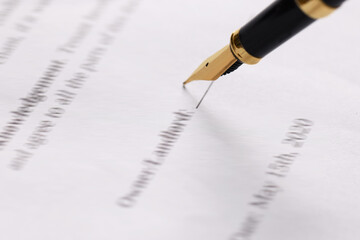 Writing on document with fountain pen, closeup. Notary contract