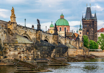 Prague cityscape with Old Town Bridge Tower and Charles bridge over Vltava river, Czech Republic
