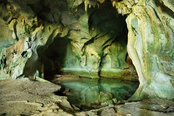 A limestone cave in Coron, Palawan in the Philippines with impressive rock formations on the...