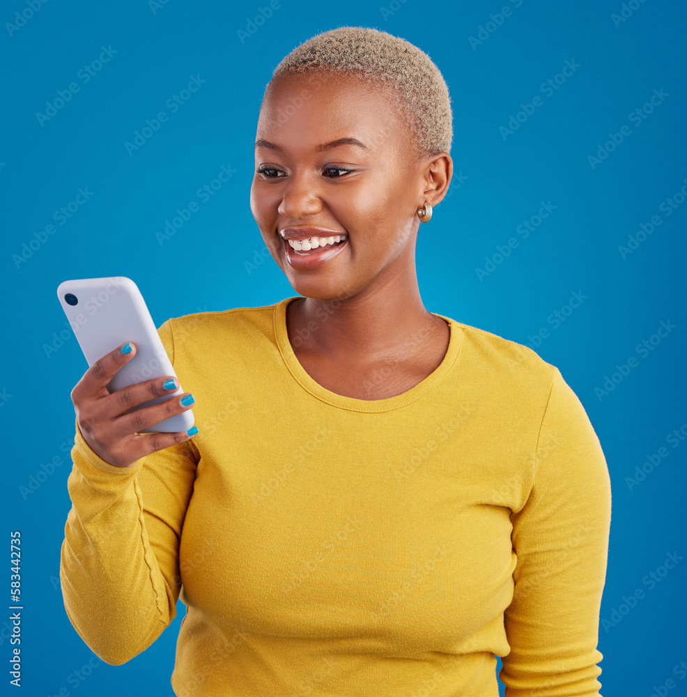 Poster phone, happy and black woman typing in studio for social media, text message and browse website. com