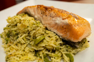 Freshly Homemade Salmon on a Bed of Cheddar and Broccoli Rice