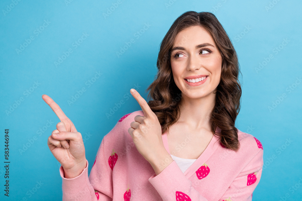 Sticker Photo portrait of young lady look fingers point empty space dressed stylish pink strawberry print garment isolated on blue color background