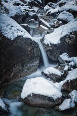Winter view on Nardis waterfall in Val di Genova, Adamello-Brenta Natural Park in the northern Italy. January 2023