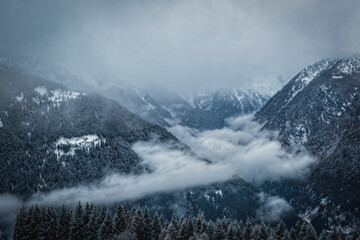 Skiing in Italy, Dolomites, Madonna di Campiglio, Pinzolo. Cloudy winter day in January 2023