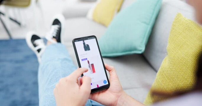 Woman, hands and phone browsing homepage, website or mobile app for ecommerce on living room sofa at home. Hand of female scrolling on smartphone screen display for beauty products or online shopping