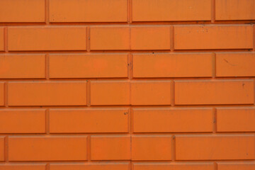 Obraz premium Backdrop - dusty bright orange brick veneer wall