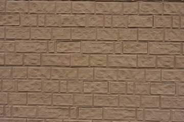 Backdrop - light brown painted brick veneer wall