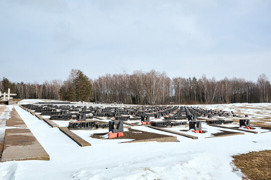 Khatyn, Belarus - March 13, 2021 Village cemetery memorial complex. Victims of the Second World War. Symbol of the mass destruction of civilians by the Nazis. Visitors. Spring season. March