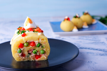  Typical Peruvian dish called causa rellena, which is served as a starter.
